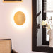 aplique-de-pared-led-18w-de-aluminio-iris-dorado.jpg